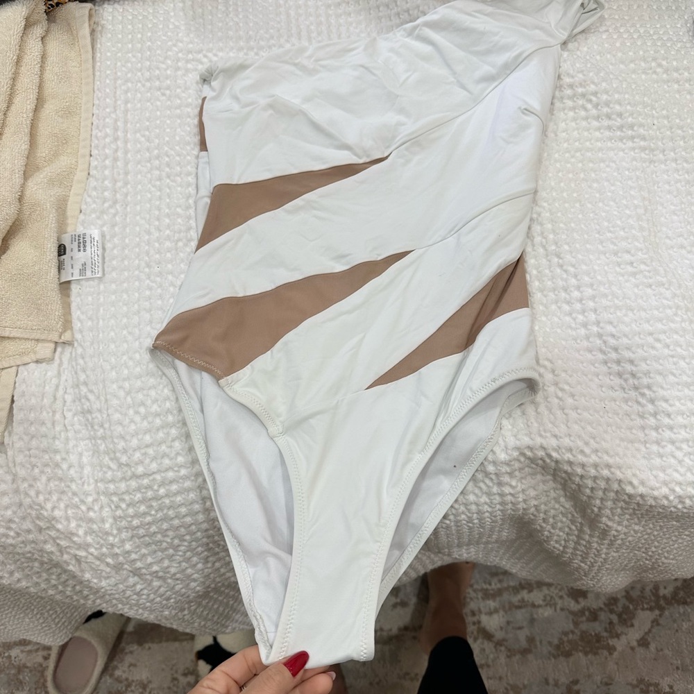 White and nude one piece swim suit